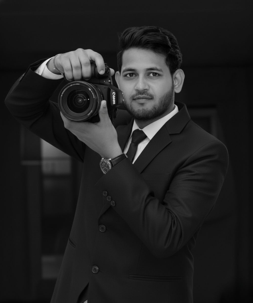 Shakib founder of Picture Planet holding camera during professional photo shoot